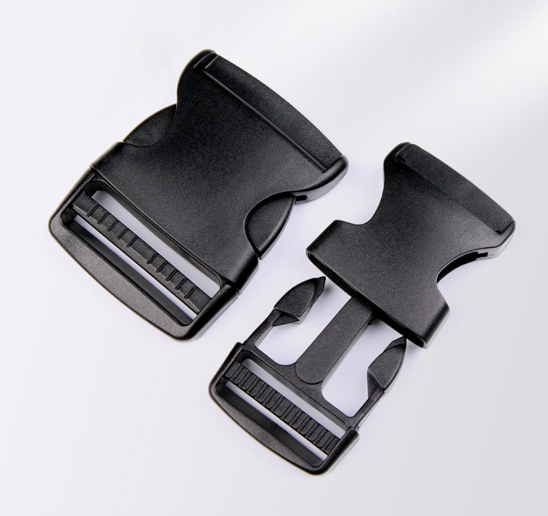 Black side-release buckles in several sizes for bag webbing