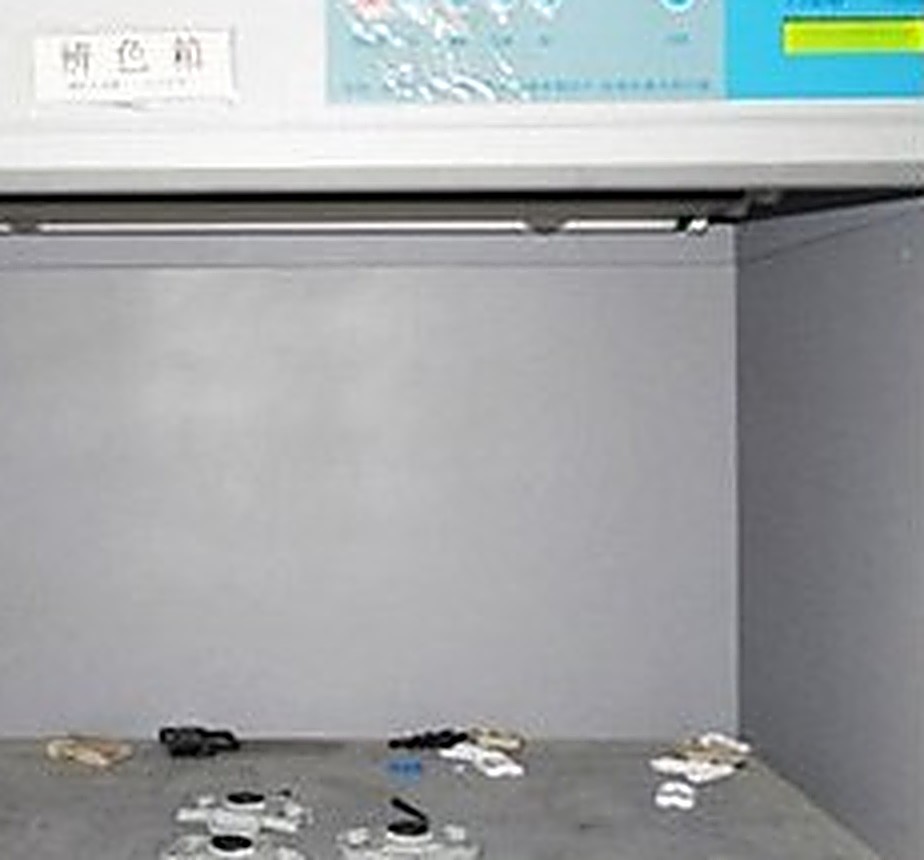 Colorimeter used to evaluate buckle color consistency