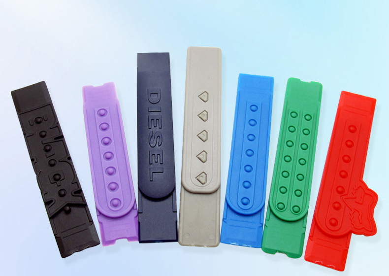 Seven-hole cap strap adjusters in black, purple, navy, beige, blue, green and red